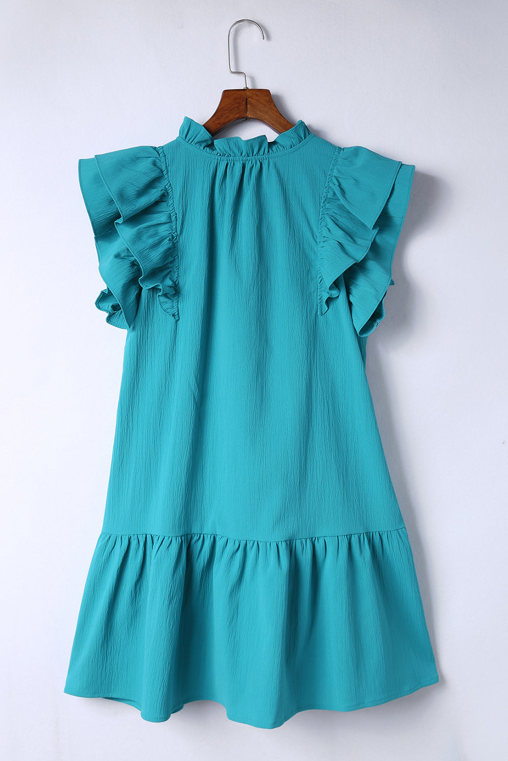 Stylish Green Tiered Mini Dress with Ruffled Sleeves and Practical Pockets