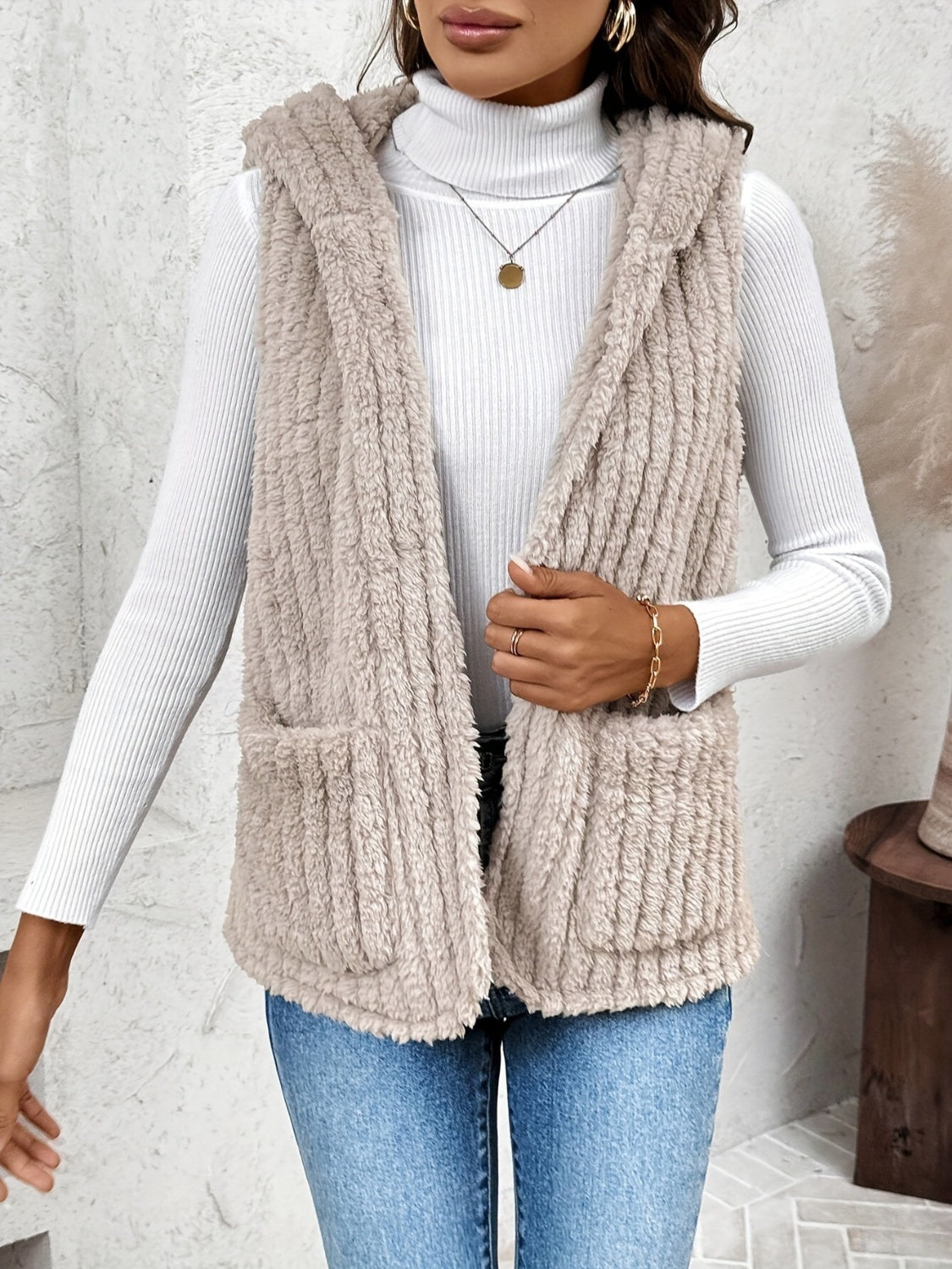 Soft Fuzzy Hooded Vest with Handy Pockets - A Fashionable and Functional Outerwear Piece