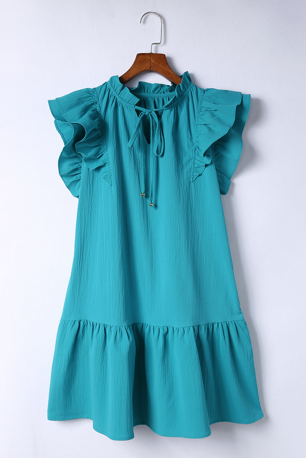 Stylish Green Tiered Mini Dress with Ruffled Sleeves and Practical Pockets
