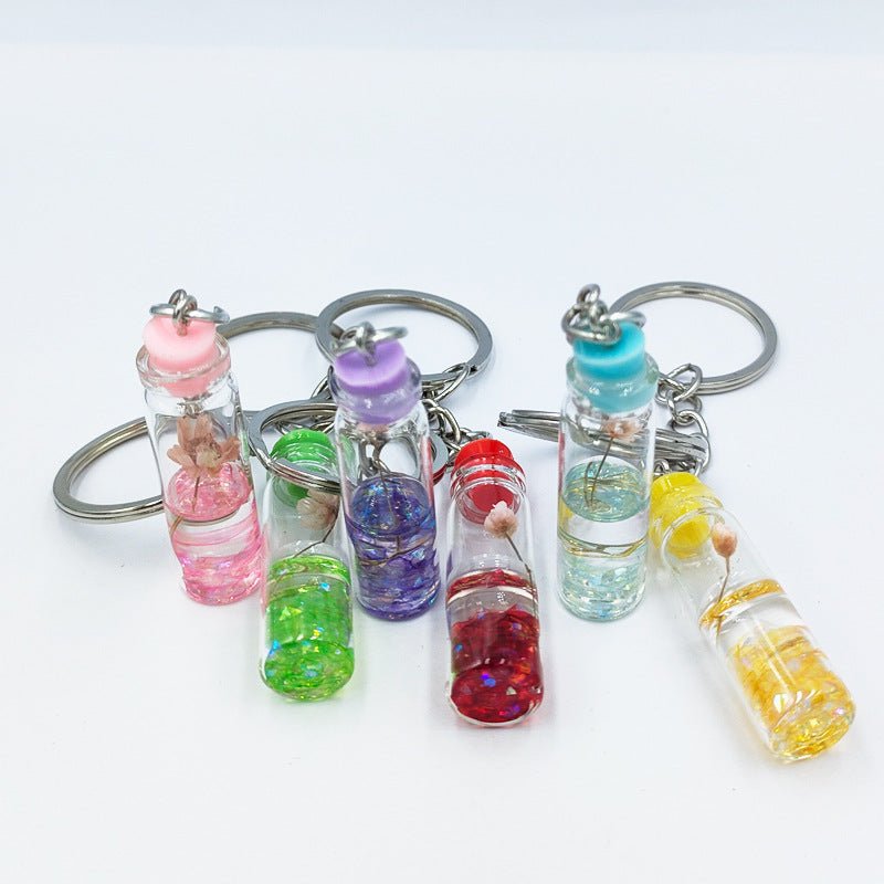Decorative Keychain with Dried Flower Enclosed in a Bottle