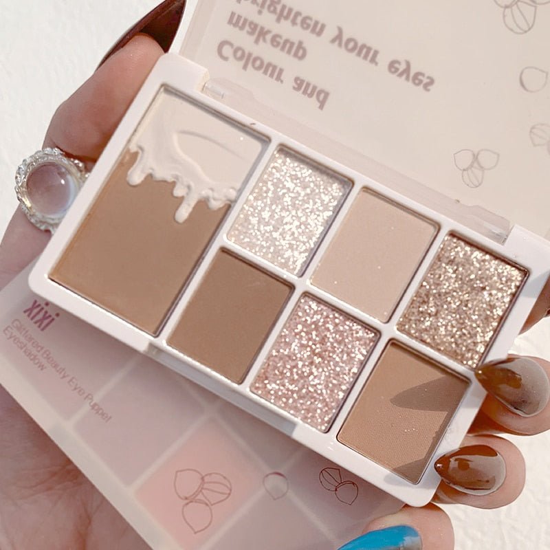 Xixi Glittery 7 - Color Eyeshadow Palette with Matte and Shimmer Finishes for Long - Lasting, Waterproof, and Eye - Brightening Makeup Cosmetics