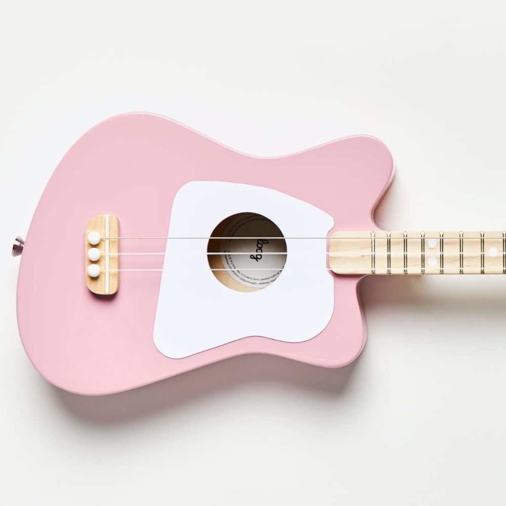Pink-colored Loog Mini Acoustic Guitar Ideal for Young Musicians