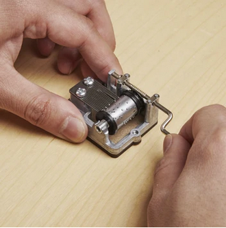 Unique Hand - Crank Music Box Playing 'Over The Rainbow'